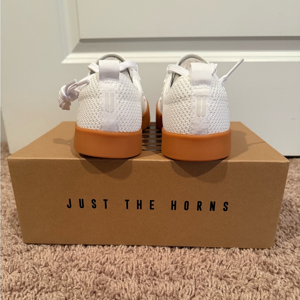 Brand New. Never Worn. Sizing is true to size